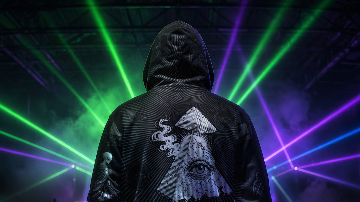 Coordinates Unknown zip hoodie, back view, under green and violet lasers