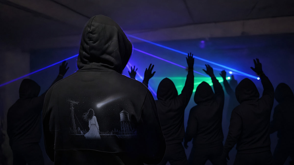 Last Call zip hoodie, back view, in a crowd under blue lasers