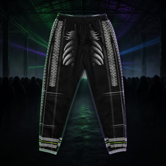 Armor Spine Track Pants: black rave track pants with chrome biomech armor spine design with neon green accents, front view