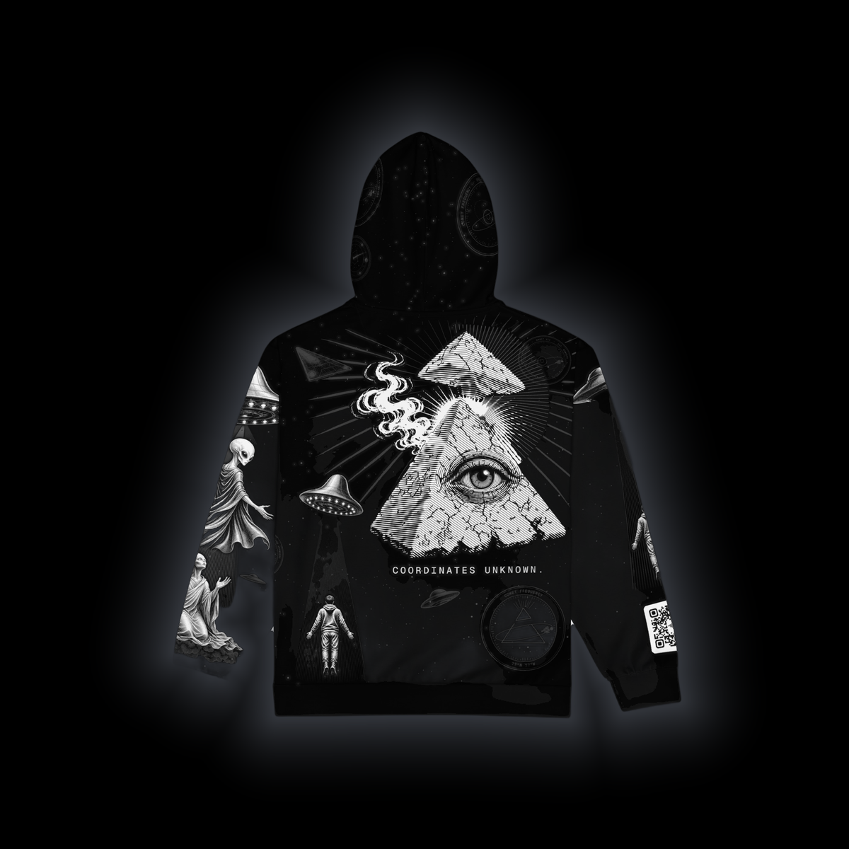 Coordinates Unknown zip hoodie laid flat, back: eye-pyramid above COORDINATES UNKNOWN., a saucer lifting a figure, seals and stars on a black ground