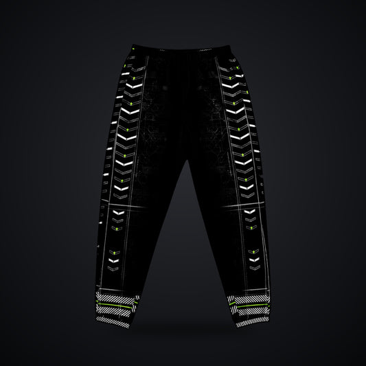 Vector Spine Track Pants: black rave track pants with white chevron spine and neon green circuit design, front view